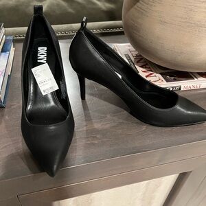 DKNY Shoes brand new. Black color. Size 11.